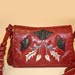 Handmade red leather purse with black and silver inlay