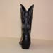 Custom cowboy boot of black french calf black alligator belly toe and ear pulls