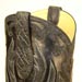 handmade custom cowboy boot of black elephant with elephant collar and ear pulls