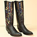black ostrich handmade cowboy boot with peacock inlay and crystals on a regal shaft